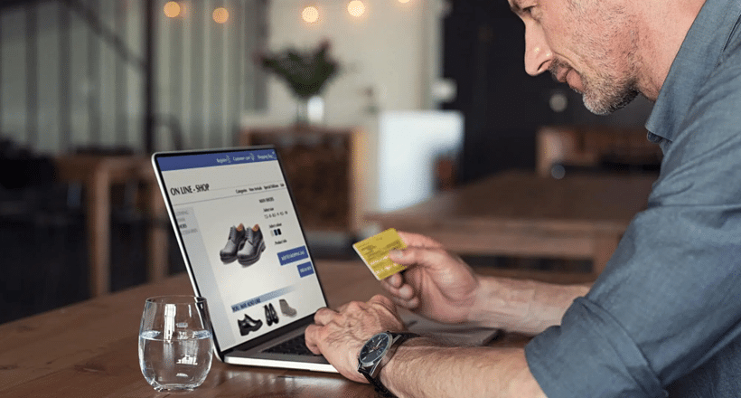 Man Shopping For Shoes Online